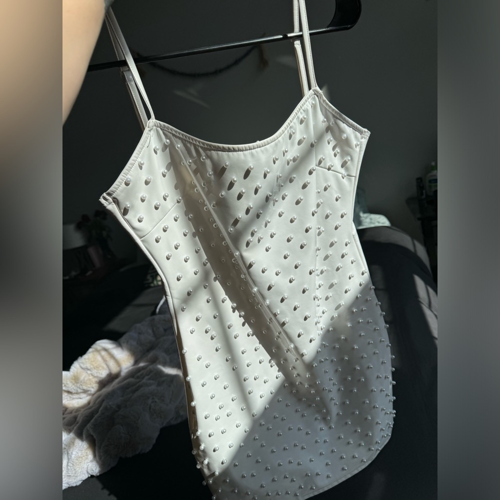 White faux leather pearl mini dress